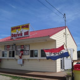 a white building with a red roof a white building with a red roof
