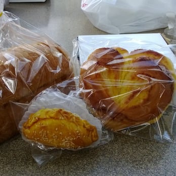Uncle Chuang's Bakery - Raisin brad, curry roll, coconut roll.  The raisin bread and coconut rolls are NOT good :-( - Bakeries Near Me - Riverside, California