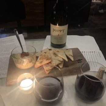 Brennan's - Complimentary pita and hummus with a bottle of pinot - Wine Bars Near Me - Saint Louis, Missouri