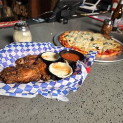 Smoked wings and pizza