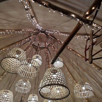Industry City - Hygge Haus: t-pee Scandinavian inspired tent w/ rows of seats & tables. You can sit and eat your food that you purchased frm the food Hall. - Venues & Event Spaces Near Me - Brooklyn, New York
