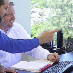 Zein Insurance Services - Owner Hisham Elzein working with Scott Haselwood, at the offices located in Woodland Hills, California.
