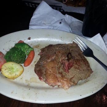 Irish Bred Pub - My medium rare steak, no wonder the meal took so long to get  They had to wrestle the cow - American Near Me - Opelika, Alabama