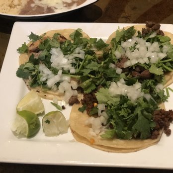 Cascabel - This is they're taco platter which you can choose the meat I chose beef, chicken, and taco vampiro. - Mexican Near Me - Angels Camp, California