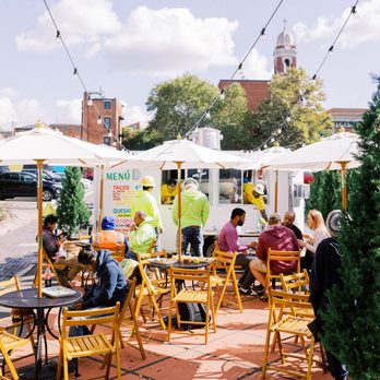 Pata Roja Taqueria - people sitting at tables with umbrellas - Tacos Near Me - Cincinnati, Ohio Pata Roja Taqueria - people sitting at tables with umbrellas - Tacos Near Me - Cincinnati, Ohio