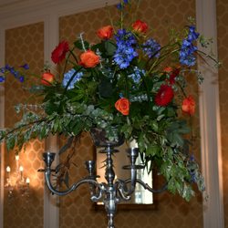 Burke Florist - Beautiful, tall arrangements in candleabras.