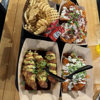 Edgewater Public Market - Yard Birds Asian and buffalo tenders with sides of waffle and sweet potato fries! - Bars Near Me - Edgewater, Colorado Edgewater Public Market - Yard Birds Asian and buffalo tenders with sides of waffle and sweet potato fries! - Bars Near Me - Edgewater, Colorado