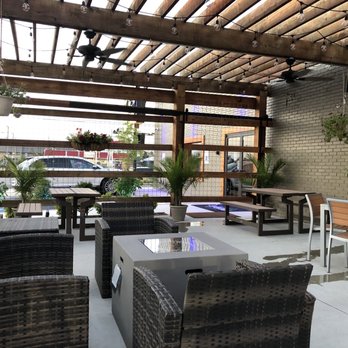 Las Palmas - a patio with wicker furniture - Tex-Mex Near Me - Oklahoma City, Oklahoma Las Palmas - a patio with wicker furniture - Tex-Mex Near Me - Oklahoma City, Oklahoma
