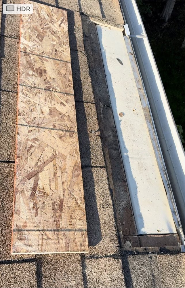 Slide of LXS Roofing