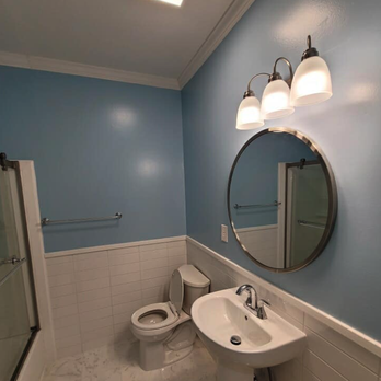 Tri County Home Renovations - a bathroom with blue walls - Flooring Near Me - Barnwell, South Carolina Tri County Home Renovations - a bathroom with blue walls - Flooring Near Me - Barnwell, South Carolina