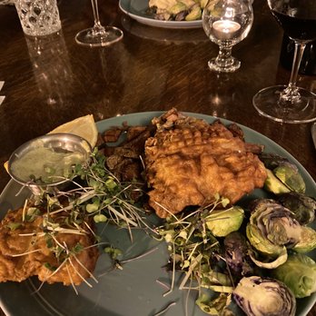Zach's Bistro - Wine battered fresh rockfish, German potato salad, Brussel sprouts, remoulade - New American Near Me - Newport, Oregon Zach's Bistro - Wine battered fresh rockfish, German potato salad, Brussel sprouts, remoulade - New American Near Me - Newport, Oregon