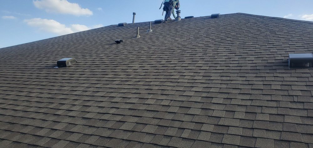 Slide of Signature Roofing & Coatings