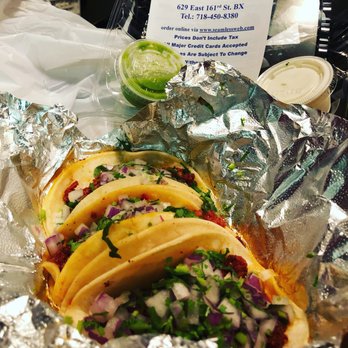 Margheritas Mexican Cuisine - three tacos on tin foil - Mexican Near Me - Bronx, New York Margheritas Mexican Cuisine - three tacos on tin foil - Mexican Near Me - Bronx, New York
