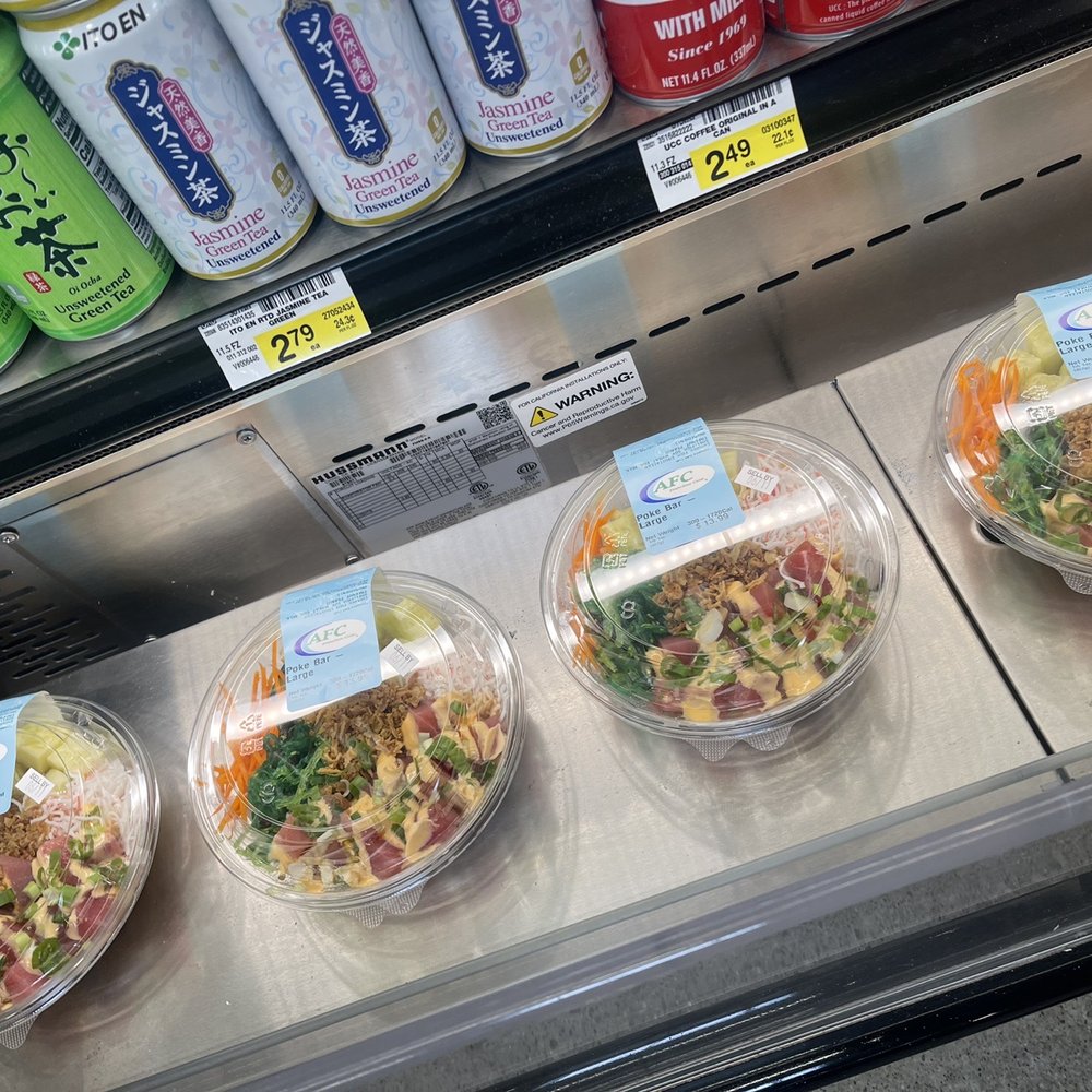 a variety of salads in plastic containers a variety of salads in plastic containers
