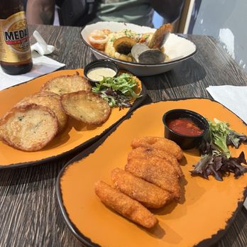 Sazón Cocina Criolla - Mini alcapurrias, mini bacalaoitos, seafood Mofongo with garlic butter sauce - Seafood Near Me - San Juan, Puerto Rico Sazón Cocina Criolla - Mini alcapurrias, mini bacalaoitos, seafood Mofongo with garlic butter sauce - Seafood Near Me - San Juan, Puerto Rico