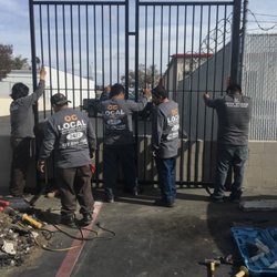 OC Local Garage Door & Gate - Installing new commercial Gates and fence by local garage doors and Gates Inc