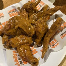 Hooters - Hooters - Naked Wings (10) - traditional style, no breading with Hooters spicy garlic sauce (5 flames) and bleu cheese dressing