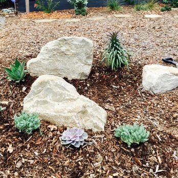 Lyngso Garden Materials - Windsor Boulders in the front yard. The mulch is Lyngso's Walk-On Bark. - Building Supplies Near Me - San Carlos, California