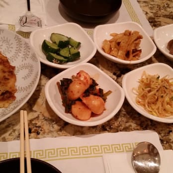 Spoon & Chopstick - Side dishes and a complimentary Mukeunji Jeon, aged kimchi korean pancake. So good! - Korean Near Me - Palisades Park, New Jersey Spoon & Chopstick - Side dishes and a complimentary Mukeunji Jeon, aged kimchi korean pancake. So good! - Korean Near Me - Palisades Park, New Jersey