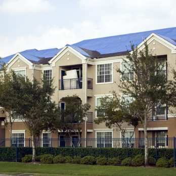 NGTX - an apartment building with a blue roof - General Contractors Near Me - Georgetown, Texas NGTX - an apartment building with a blue roof - General Contractors Near Me - Georgetown, Texas