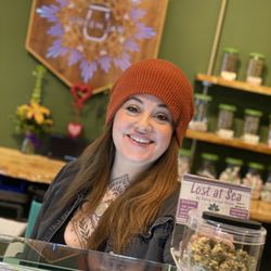 Green Jar - Budtender Miriah serving marijuana flower at wasilla dispensary, Green Jar.