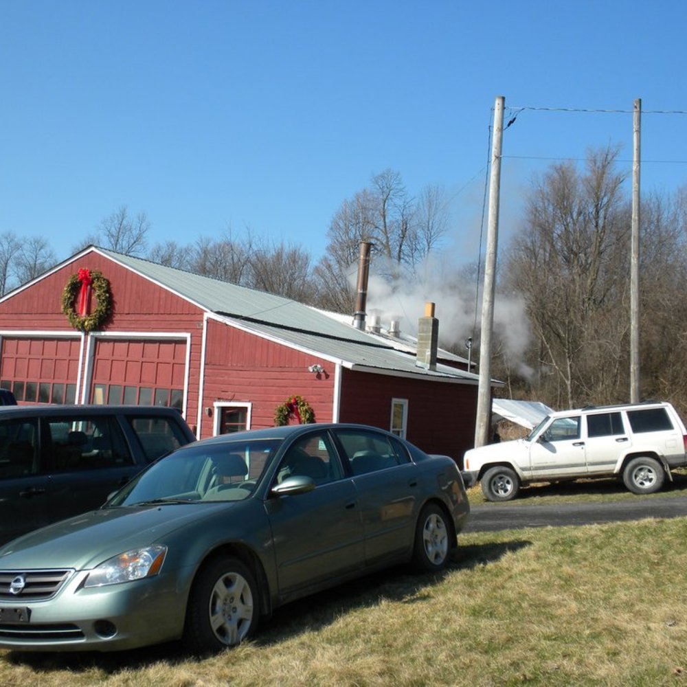 Vermont Trade Winds Farm - cars parked in front of a barn - Specialty Food Near Me