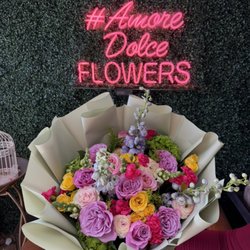 Amore Dolce Flowers - Purple roses Ecuadorian roses, ranunculus light blue Delphinium and a stunning bouquet birthday flower delivery