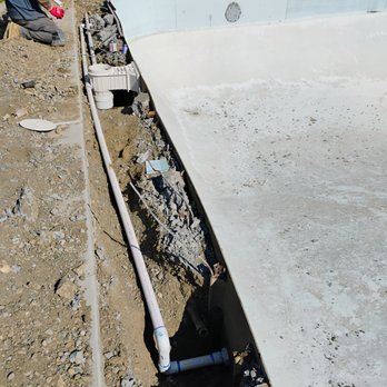 Kraken Pool Service And Installation - After demo of concrete reinstallation of piping. - Pool & Hot Tub Service Near Me Kraken Pool Service And Installation - After demo of concrete reinstallation of piping. - Pool & Hot Tub Service Near Me