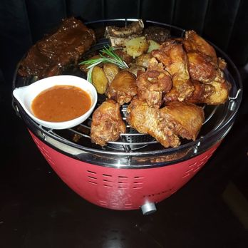 Deluxe Fun Dining - Chicken wing,s beef ribs & lamp chops - Bars Near Me - Charlotte, North Carolina