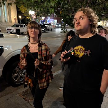 Seaside Shadows - Leah and Josh with their ghost hunting instruments - Historical Tours Near Me