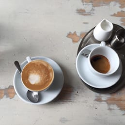 Almond milk cappuccino and an Americano.