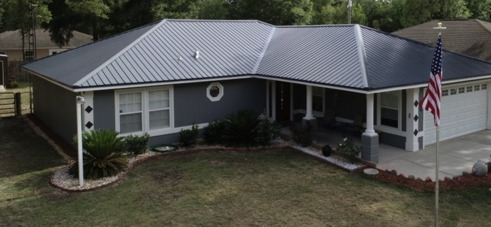 Slide of T Mark Roofing