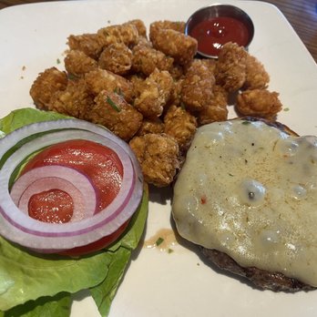 Sets Kitchen & Bar - Burger on Burger Night (Tuesday) with crunchy tots. The burger is terrific. - New American Near Me - San Marcos, California Sets Kitchen & Bar - Burger on Burger Night (Tuesday) with crunchy tots. The burger is terrific. - New American Near Me - San Marcos, California