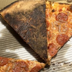Panzinis Pizza House - Don't ask for a lite bake cause this is what you'll get