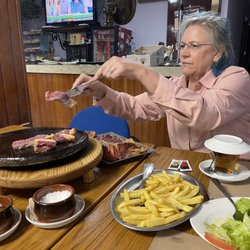 Café-Bar O Pedrouzo - Salad, fries and steak we just started cooking from the tray of sliced meat
