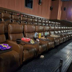Cinemark North McKinney and XD - Freaking lazy  people. This is our current society.  Thanks to bad parenting of lack of parents