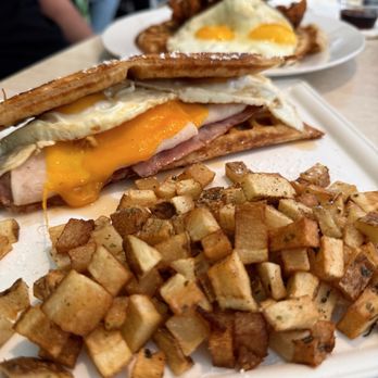Dos Cafés - Waffle Breakfast Sandwich (front), 12 Spice Chicken and Waffle; Follow me @RimyEats on Instagram - Breakfast & Brunch Near Me - San Juan, Puerto Rico