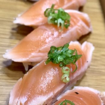 Itokomiami - Seared salmon nigiri with scallions. - Personal Chefs Near Me