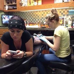 Bugaboo Tattoo - Southlake - Audrey working on my sister's thigh piece
