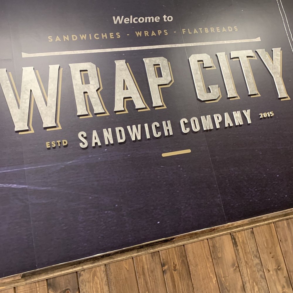 a sign for wrap city sandwich company a sign for wrap city sandwich company