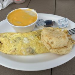 The Corner Deli - Veggie omelette, cheese grits and biscuit.