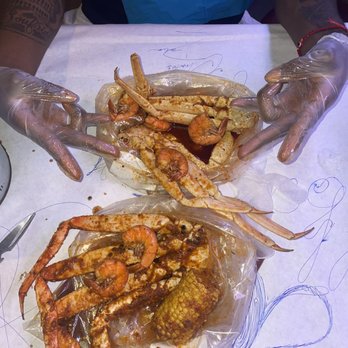 Angry Crab Shack - Snow & queen crab trifecta 2/4 with corn and shrimp - Seafood Near Me - Tucson, Arizona Angry Crab Shack - Snow & queen crab trifecta 2/4 with corn and shrimp - Seafood Near Me - Tucson, Arizona