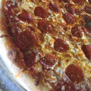 Gustavo's - You can't tell from the photo but the crust is barely cooked and the center is raw. - Pizza Near Me - Dahlonega, Georgia Gustavo's - You can't tell from the photo but the crust is barely cooked and the center is raw. - Pizza Near Me - Dahlonega, Georgia
