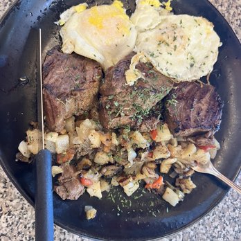 Tucker Duke's - Luna - short rib, onions, peppers and potato hash. topped with two sunny side up eggs - Burgers Near Me - Deerfield Beach, Florida