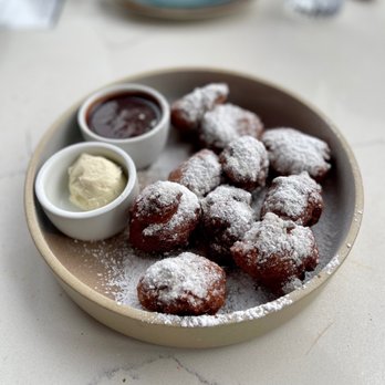 Buttermilk & Bourbon - Fresh Fried Beignets with chocolate sauce - Tapas/Small Plates Near Me - Watertown, Massachusetts Buttermilk & Bourbon - Fresh Fried Beignets with chocolate sauce - Tapas/Small Plates Near Me - Watertown, Massachusetts