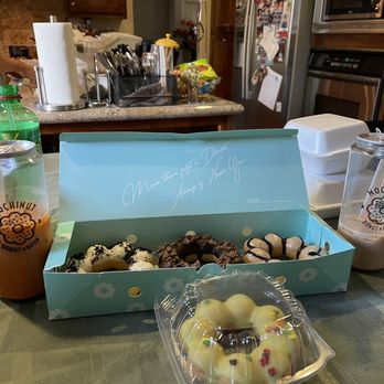Mochinut - a box of doughnuts on a table - Donuts Near Me - Modesto, California