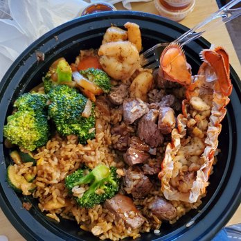 Flame Hibachi - a bowl of food on a table - Food Trucks Near Me - Mira Loma, California