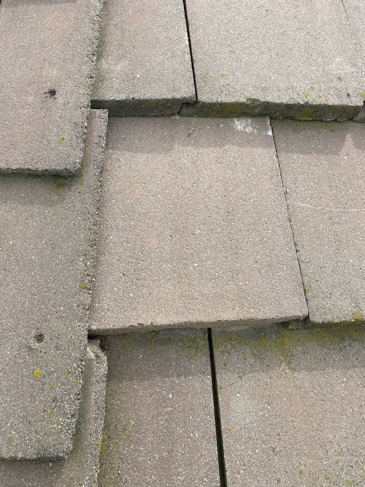 Slide of TMH Roofing