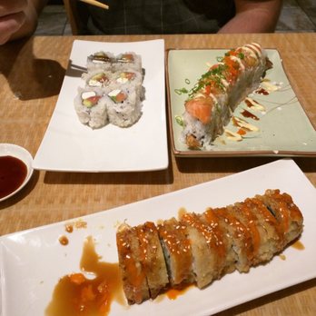 Sushi Hook - Philadelphia on the left, spicy crunchy California on the bottom, and the right corner is a salmon and shrimp roll. - Sushi Bars Near Me - Sacramento, California Sushi Hook - Philadelphia on the left, spicy crunchy California on the bottom, and the right corner is a salmon and shrimp roll. - Sushi Bars Near Me - Sacramento, California