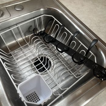 Lazie Bone Home Services - Paint in sink - Gutter Services Near Me - Littleton, Colorado Lazie Bone Home Services - Paint in sink - Gutter Services Near Me - Littleton, Colorado